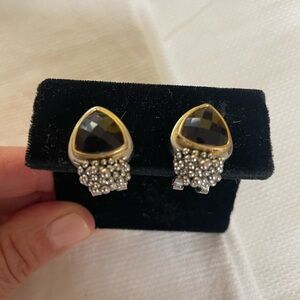 Silver earrings with dark purple gemstone